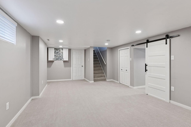 426 14th Ave N, Hopkins, MN 55343 - basement featuring recessed lighting, baseboards, light colored carpet, stairs, and a barn door