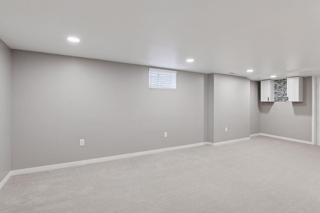 426 14th Ave N, Hopkins, MN 55343 - below grade area with light carpet, recessed lighting, and baseboards