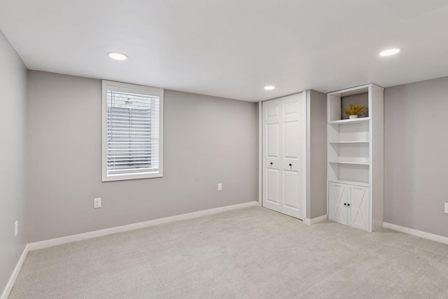 426 14th Ave N, Hopkins, MN 55343 - unfurnished bedroom featuring light colored carpet, recessed lighting, baseboards, and a closet