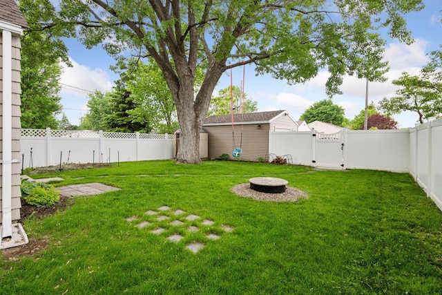 426 14th Ave N, Hopkins, MN 55343 - view of yard with a gate and an outdoor fire pit