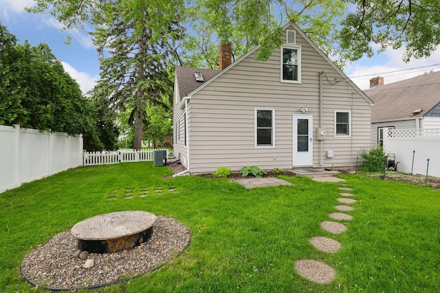 426 14th Ave N, Hopkins, MN 55343 - back of property with a chimney and central AC unit