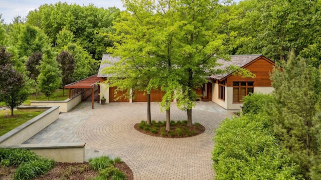 20545 Linden Rd, Deephaven, MN 55331 - view of front of property with curved driveway and stucco siding