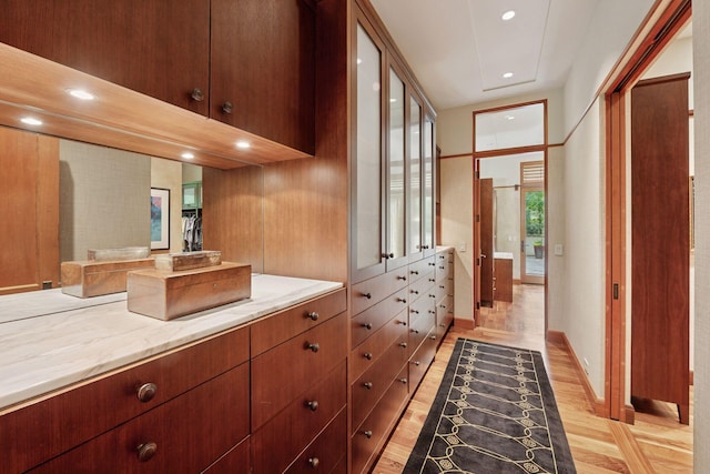 20545 Linden Rd, Deephaven, MN 55331 - bathroom with vanity, wood finished floors, recessed lighting, and baseboards