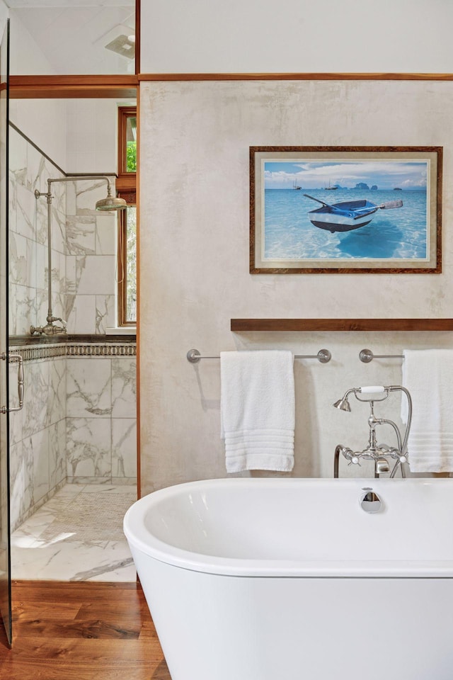 20545 Linden Rd, Deephaven, MN 55331 - full bathroom featuring a freestanding bath, a marble finish shower, and wood finished floors