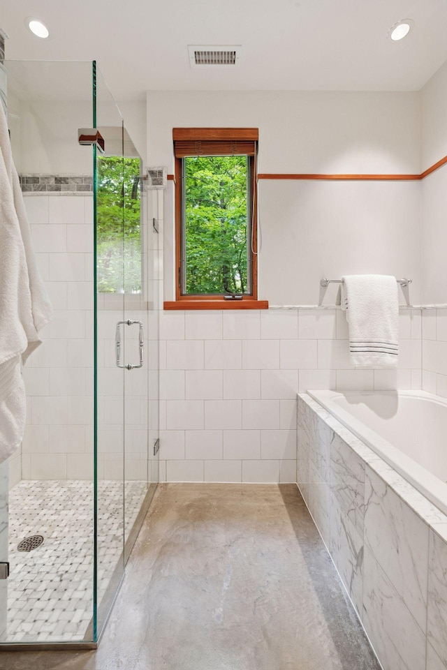 20545 Linden Rd, Deephaven, MN 55331 - full bathroom with a stall shower, a garden tub, and recessed lighting
