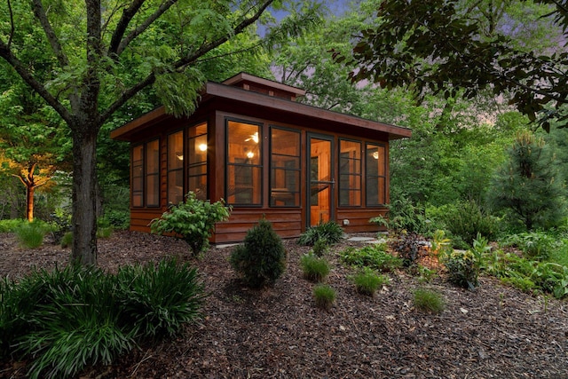 20545 Linden Rd, Deephaven, MN 55331 - view of outdoor structure with a sunroom