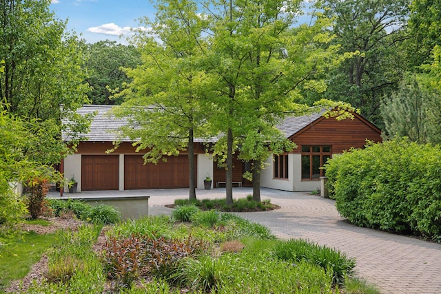 20545 Linden Rd, Deephaven, MN 55331 - view of front of property with driveway and stucco siding