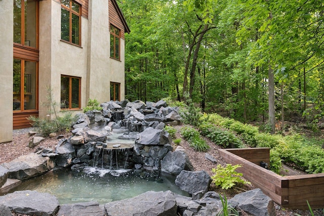 20545 Linden Rd, Deephaven, MN 55331 - view of yard with a small pond and a garden