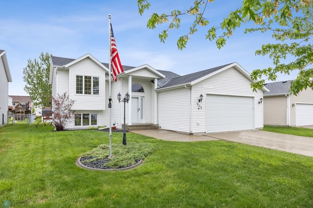 909 Homestead Ct, West Fargo, ND 58078 - view of front of property featuring a garage, concrete driveway, a front yard, and a shingled roof