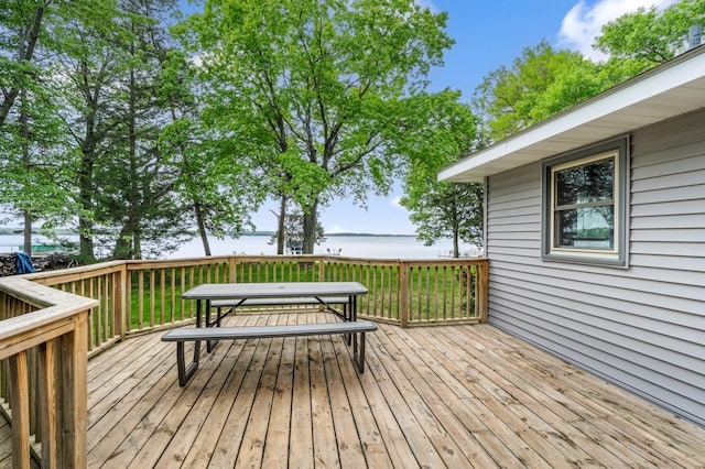 10001 Jeske Ave NW, Corinna Twp, MN 55302 - wooden deck featuring a water view and outdoor dining space