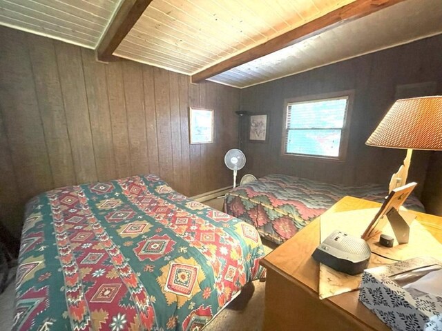 25186 US-71 # 18, Park Rapids, MN 56470 - carpeted bedroom with multiple windows, wood walls, beamed ceiling, and wooden ceiling