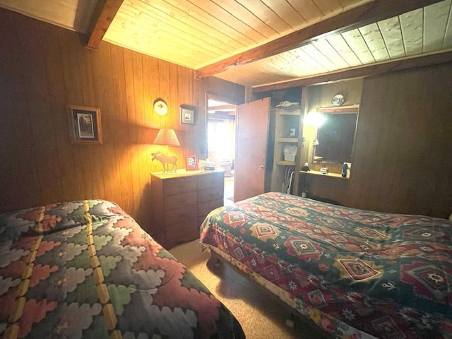 25186 US-71 # 18, Park Rapids, MN 56470 - bedroom with wooden walls, a wood ceiling with exposed beams, and carpet