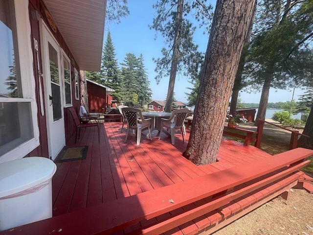 25186 US-71 # 18, Park Rapids, MN 56470 - deck featuring outdoor dining area and a water view