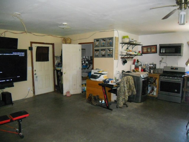 39769 Kestrel Ave, Tamarack, MN 55787 - kitchen with appliances with stainless steel finishes, a ceiling fan, and concrete floors