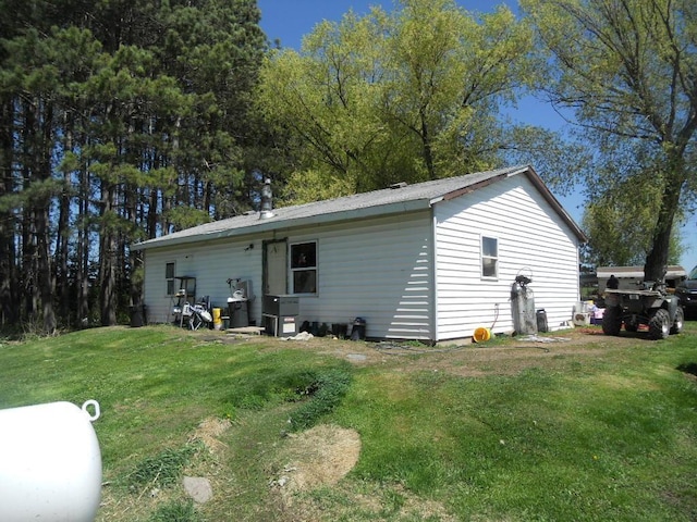 39769 Kestrel Ave, Tamarack, MN 55787 - back of house with a lawn
