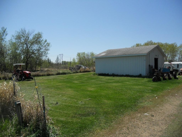 39769 Kestrel Ave, Tamarack, MN 55787 - view of grassy yard with a pole building and an outbuilding
