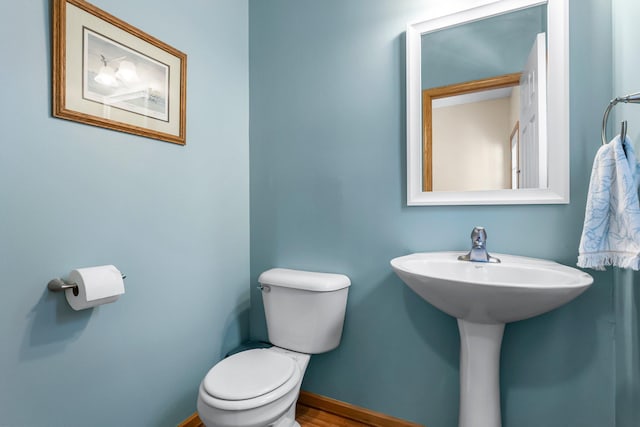 2737 Faulkner Dr, Chaska, MN 55318 - half bathroom with toilet and baseboards