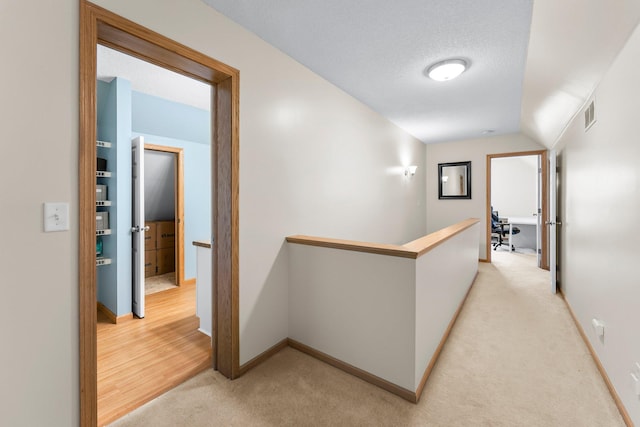 2737 Faulkner Dr, Chaska, MN 55318 - hall featuring an upstairs landing, light carpet, and baseboards
