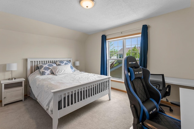 2737 Faulkner Dr, Chaska, MN 55318 - bedroom with light colored carpet, a desk, lofted ceiling, and a textured ceiling