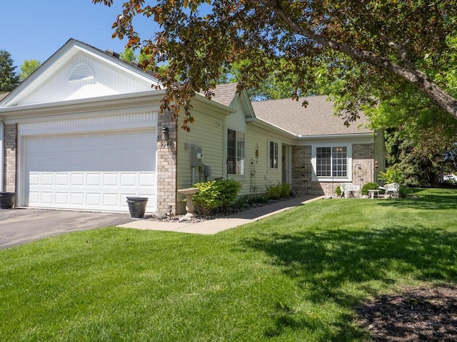9349 Kimberly Ln N, Maple Grove, MN 55311 - ranch-style home with brick siding, asphalt driveway, a front yard, and an attached garage