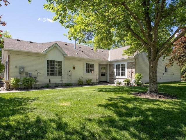9349 Kimberly Ln N, Maple Grove, MN 55311 - rear view of house featuring a lawn and roof with shingles