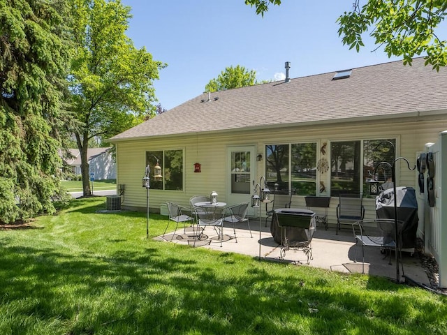 9349 Kimberly Ln N, Maple Grove, MN 55311 - back of house with a patio, a lawn, roof with shingles, and cooling unit
