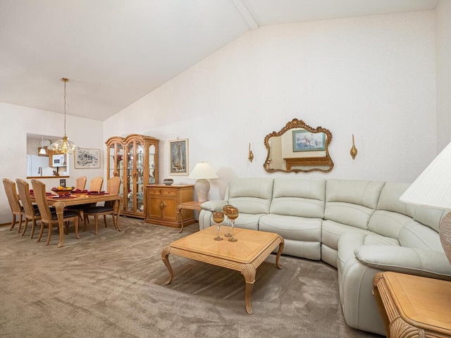 9349 Kimberly Ln N, Maple Grove, MN 55311 - living room featuring light colored carpet, a chandelier, and high vaulted ceiling