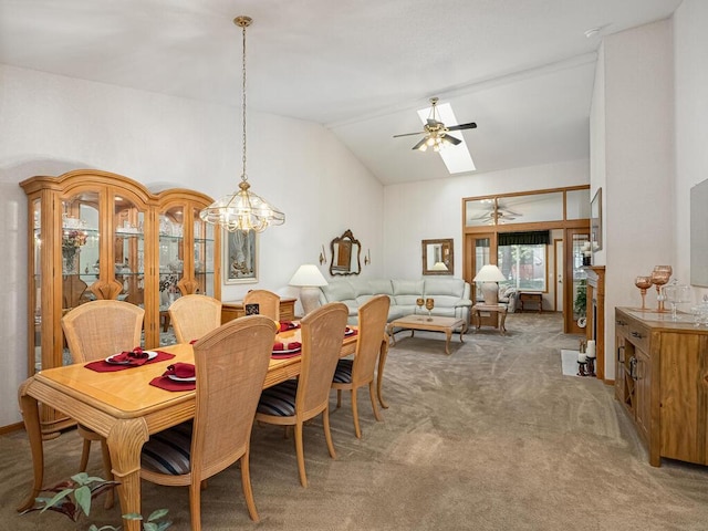 9349 Kimberly Ln N, Maple Grove, MN 55311 - dining room with a ceiling fan, light colored carpet, a chandelier, and high vaulted ceiling