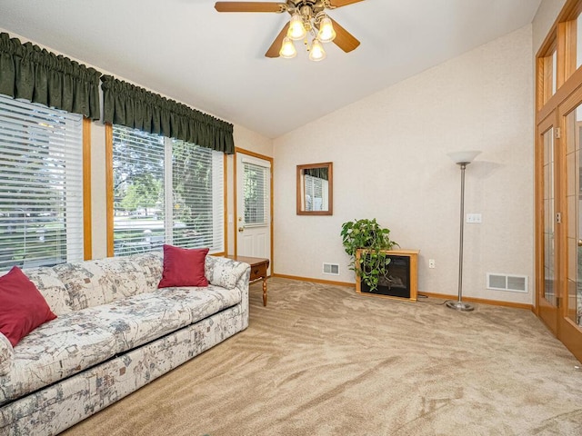 9349 Kimberly Ln N, Maple Grove, MN 55311 - living room with lofted ceiling, carpet, baseboards, and ceiling fan
