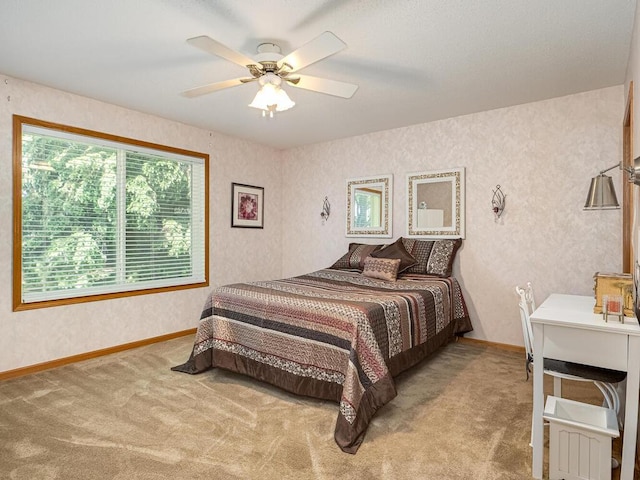 9349 Kimberly Ln N, Maple Grove, MN 55311 - carpeted bedroom with baseboards and a ceiling fan