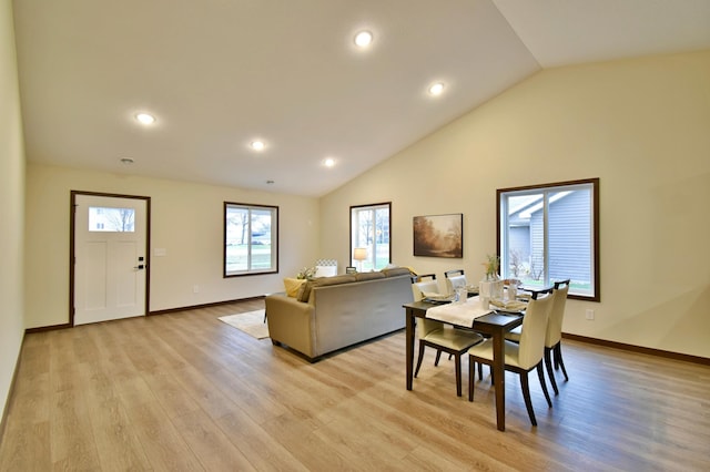 1212 7th St S, Waite Park, MN 56387 - dining room featuring lofted ceiling, healthy amount of natural light, light wood-type flooring, baseboards, and recessed lighting