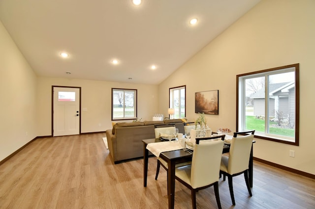 1212 7th St S, Waite Park, MN 56387 - dining space with baseboards, light wood-style flooring, recessed lighting, and high vaulted ceiling