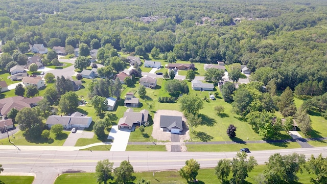 1212 7th St S, Waite Park, MN 56387 - aerial perspective of suburban area featuring a forest