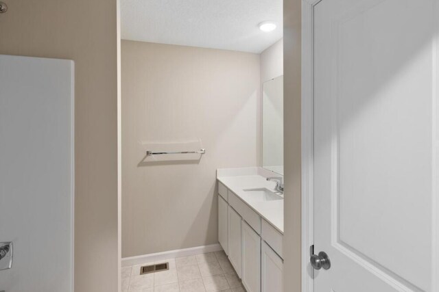 7463 147th Ln NW, Ramsey, MN 55303 - bathroom featuring baseboards and vanity