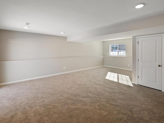 7463 147th Ln NW, Ramsey, MN 55303 - below grade area featuring carpet, baseboards, and recessed lighting