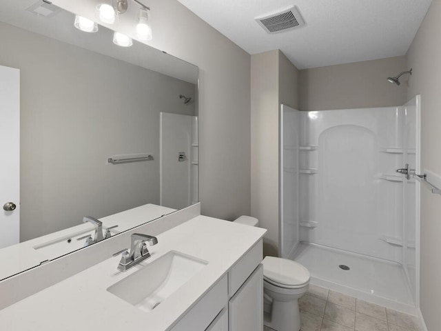 7463 147th Ln NW, Ramsey, MN 55303 - full bath with a shower, toilet, tile patterned flooring, and vanity