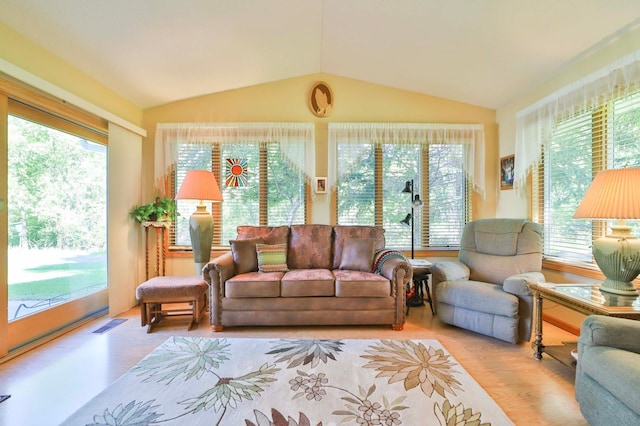 2506 Woodridge Ln, Brainerd, MN 56401 - living area featuring lofted ceiling and wood finished floors