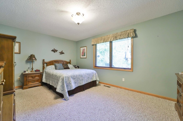 2506 Woodridge Ln, Brainerd, MN 56401 - carpeted bedroom featuring baseboards and a textured ceiling