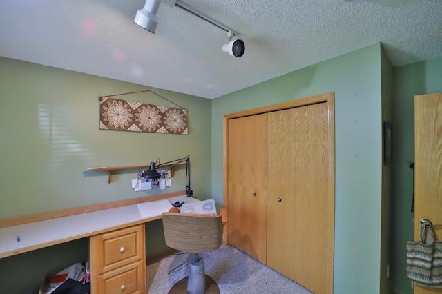 2506 Woodridge Ln, Brainerd, MN 56401 - carpeted office with a textured ceiling and track lighting