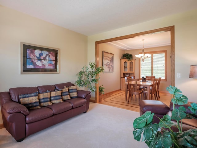 living area featuring a chandelier