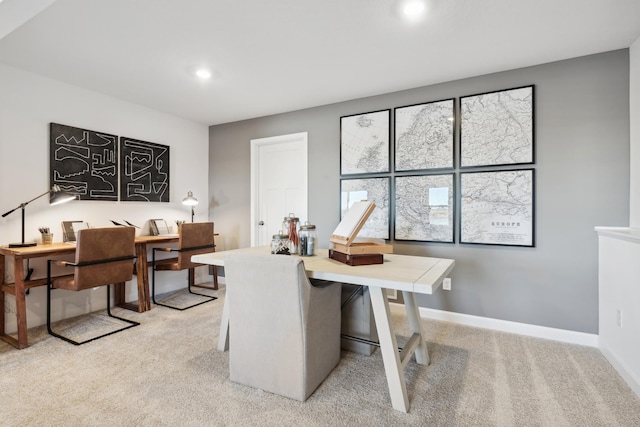 home office featuring light carpet, recessed lighting, and baseboards