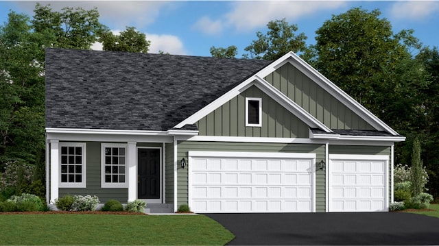 view of front facade featuring board and batten siding, driveway, roof with shingles, an attached garage, and a front yard