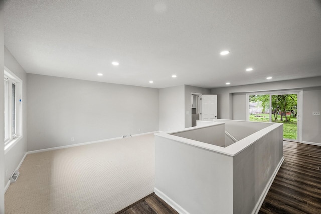 3213 63rd Ave N, Brooklyn Center, MN 55429 - kitchen featuring recessed lighting, dark wood finished floors, and baseboards