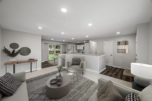 3213 63rd Ave N, Brooklyn Center, MN 55429 - living area with recessed lighting, baseboards, and dark wood-style flooring