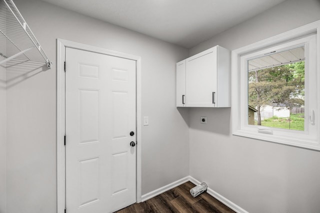 3213 63rd Ave N, Brooklyn Center, MN 55429 - washroom with hookup for an electric dryer, cabinet space, dark wood finished floors, and baseboards