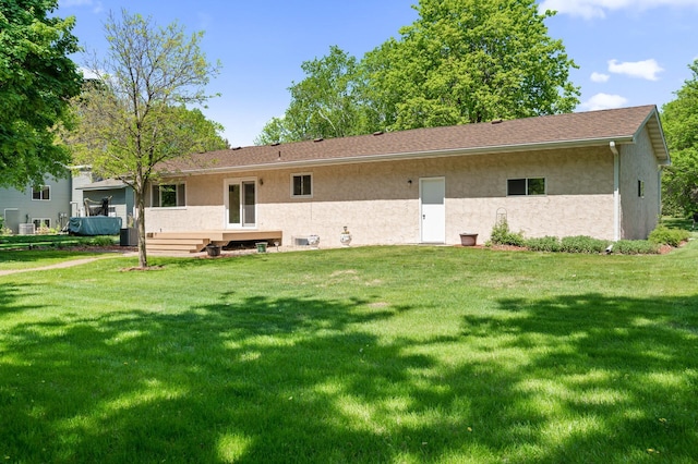 19375 181st Ave NW, Big Lake Twp, MN 55309 - back of property featuring a lawn and stucco siding