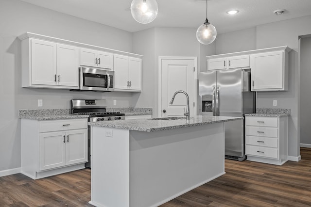 14617 Quintana St NW, Ramsey, MN 55303 - kitchen featuring stainless steel appliances, a sink, white cabinets, dark wood-type flooring, and recessed lighting
