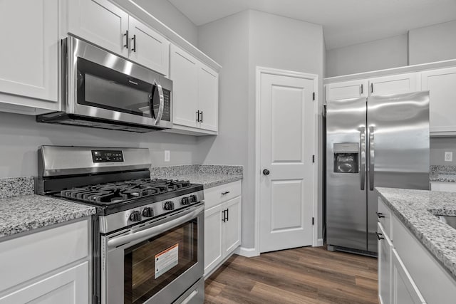 14617 Quintana St NW, Ramsey, MN 55303 - kitchen with appliances with stainless steel finishes, dark wood-type flooring, white cabinetry, and light stone countertops
