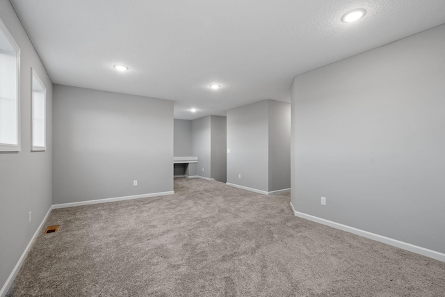 14617 Quintana St NW, Ramsey, MN 55303 - basement with carpet, baseboards, and recessed lighting