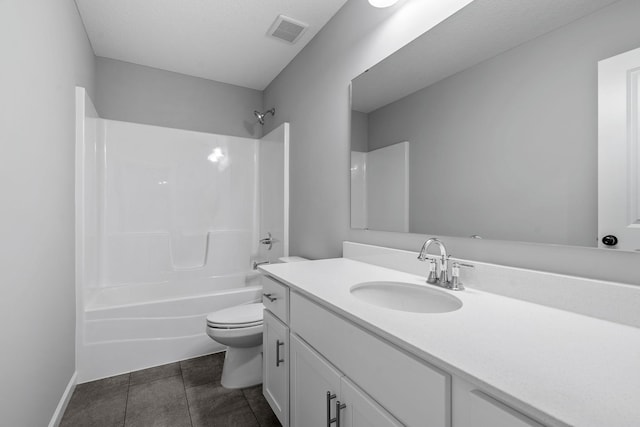 14617 Quintana St NW, Ramsey, MN 55303 - full bathroom with toilet, vanity, tile patterned flooring, tub / shower combination, and baseboards